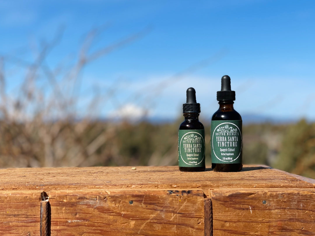Nicole's Apothecary Yerba Santa Tincture on a wood block outdoors