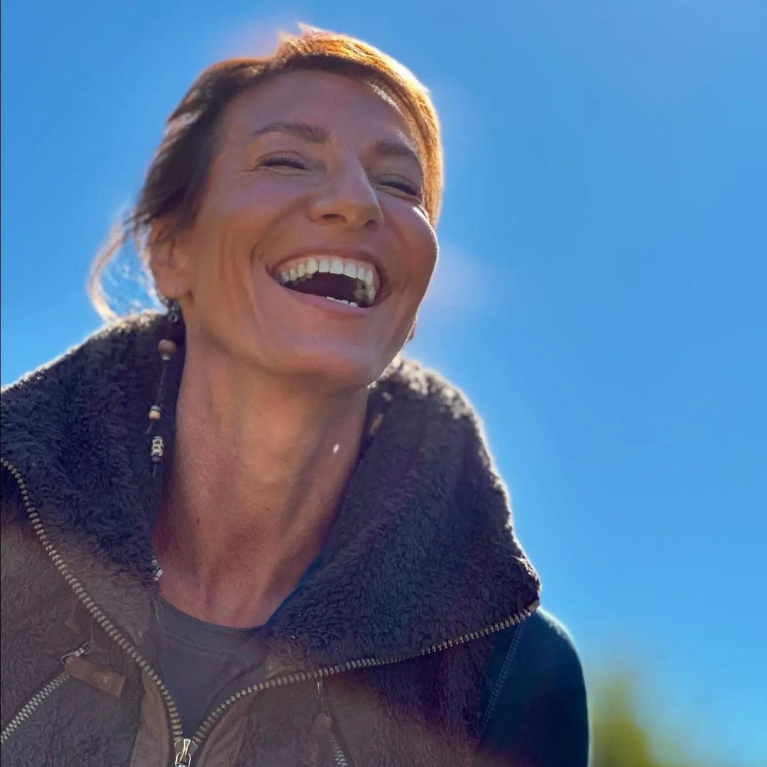 Nicole Apelian smiling in the sunshine
